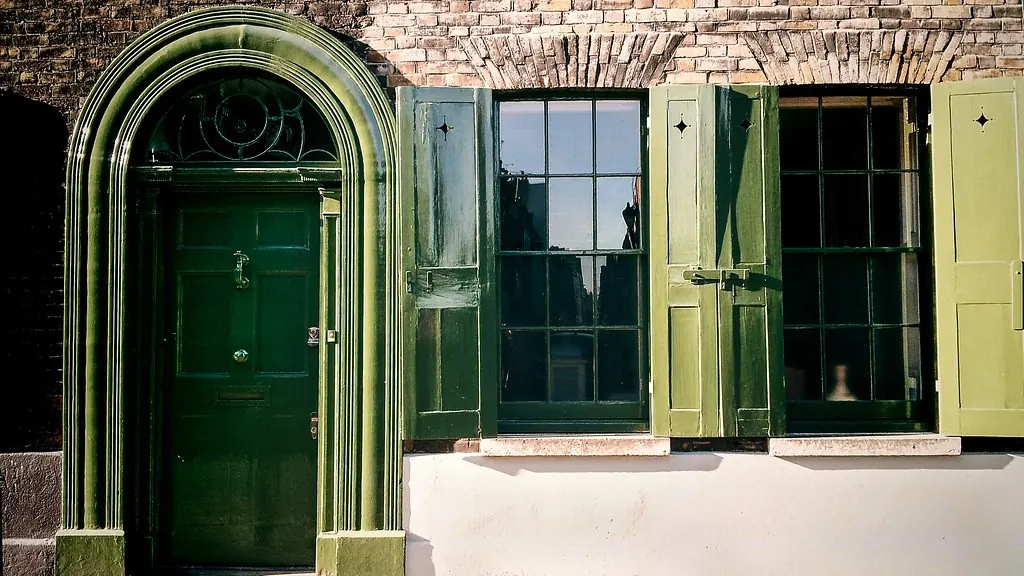 Storm shutters beside a door