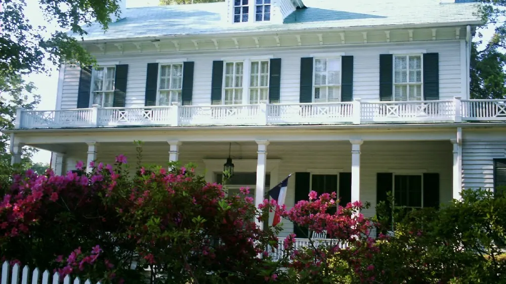 Historic home with louvered shutters